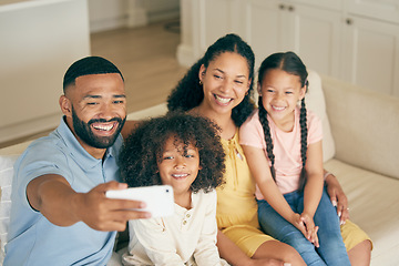 Image showing Family, home selfie and children with parents on social media, online memory and bond together on sofa. Happy biracial kids and girl or mother and father in profile picture or photography for holiday