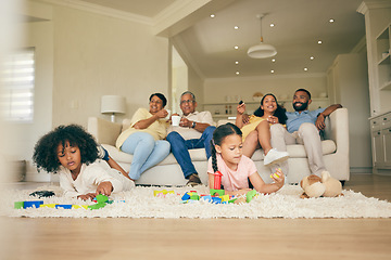 Image showing Big family, toys and playing children with parents and grandparents in lounge at home together for creative fun. Living room, happy and development of kids on carpet floor with games by mom and dad