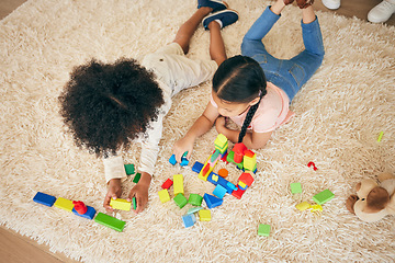 Image showing Relax, play and above of children on floor with building blocks for learning, education and child development. Family, home and top view of girls in living room with toys for fun, creativity or games