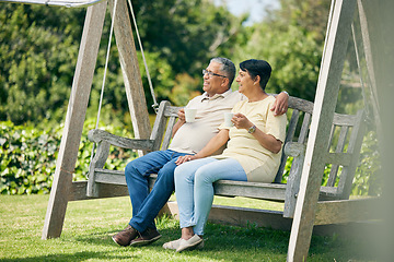 Image showing Tea, bench or old couple in park or nature talking and bonding together in retirement on holiday date. Senior, elderly man or mature woman drinking coffee to relax with love, peace or care in garden