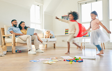 Image showing Parents on laptop, happy family and running children playing pretend games, fun or imagine being superhero, princess or ballerina. Speed energy, Halloween fantasy costume and young kids play at home