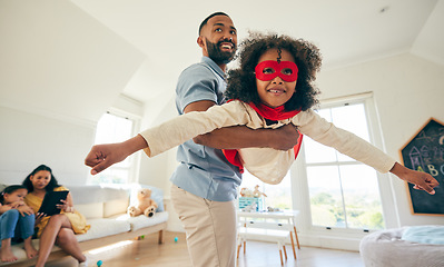 Image showing Superhero flight, father and happy kid playing pretend game, imagine flying and enjoy quality time together, fun or bond. Action hero, Halloween fantasy costume and family dad and child play at home