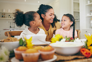 Image showing Family, mother and children at table for breakfast, lunch and eating meal at home together. Happy, morning and mom with girls in dining room with food for health, child development and nutrition