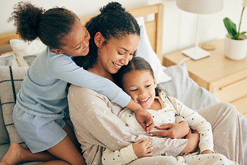 Image showing Mother, home and children hug or happy with parent together in the morning laughing in a bedroom on a bed. Funny, bonding and mom enjoy quality time with kids or girls with happiness and love