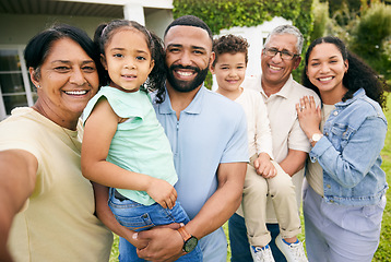 Image showing Portrait, grandparents and parents with child outdoor, happiness and bonding at holiday home. Love, care and smile, men and women with young girl on lawn of house, family vacation and relax in garden