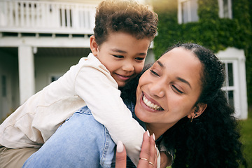 Image showing Woman, boy and piggyback, hug outdoor with love and bonding, relax on lawn at holiday home with fun and happiness. Playful, smile and trust, mother and son together in garden with vacation and nature