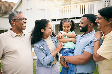 Image showing Happy people, grandparents and parents with kid outdoor, family and bonding at holiday home. Love, care and smile, men and women with young girl on lawn of house, summer vacation and relax in garden