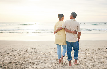 Image showing Senior couple hug, back and beach, ocean and travel with bonding and love, trust and marriage outdoor. Adventure, tropical holiday and waves, man and woman with loyalty and life partner in nature