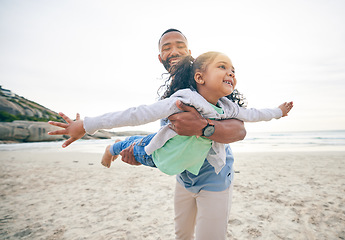 Image showing Love, airplane and father with girl child at the beach with freedom, smile and bonding in nature together. Happy, flying and parent with kid at the sea for fun, games and travel, holiday or trip