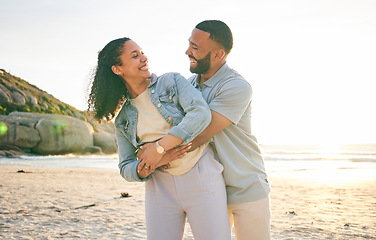 Image showing Hug, beach and couple with love, marriage and quality time with happiness, summer holiday and adventure. Romance, happy man and woman embrace, seaside vacation and relationship with sunset and smile