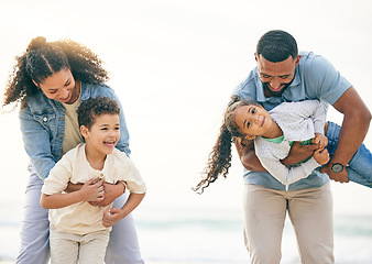 Image showing Happy, vacation and family at the beach, playing and bonding outdoor in nature together. Smile, love and children with parents and the sea for holiday, travel and relax, freedom and games in Cancun