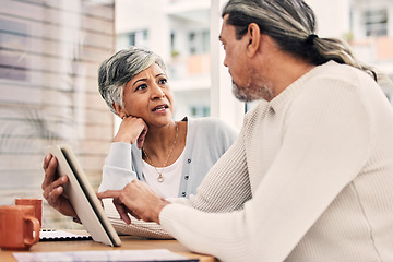 Image showing Senior couple, planning or stress on tablet with financial documents, taxes or retirement questions in cafe. Debt crisis, senior woman or mature man speaking of insurance, bills or asset management