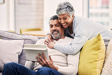 Image showing Tablet, video call and senior couple embracing while networking on social media or mobile app. Happy, communication and mature man and woman on a virtual conversation on digital technology at home.