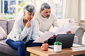 Image showing Documents, thinking and senior couple on laptop for finance paperwork, taxes and retirement at home. Planning, decision and elderly people on sofa reading insurance, bills and asset management choice