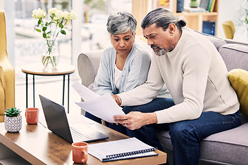 Image showing Documents, laptop and senior couple planning, finance paperwork and retirement funding or loan at home. Sofa, life insurance and asset management of elderly woman and man of bills or debt on computer