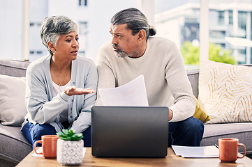 Image showing Senior couple, documents and stress on laptop with financial paperwork, taxes or retirement questions at home. Planning, debt and elderly people on sofa for life insurance, bills or asset management