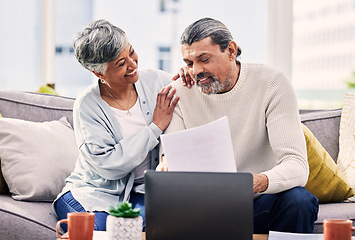 Image showing Retirement, planning and couple with documents, laptop and finance, taxes or investment goals on sofa at home. Talking, happy and senior people with life insurance and asset management on computer