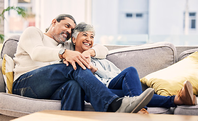 Image showing Home, happy and senior couple on a couch, love or relax with happiness, marriage or watching tv. Romantic, old woman or mature man on a sofa, relationship or smile with quality time and retirement