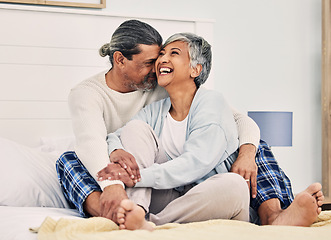 Image showing Hug, funny or old couple in bed to relax, enjoy romance or morning time together at home in retirement. Embrace, senior woman or happy elderly man laughing or bonding with love, support or smile