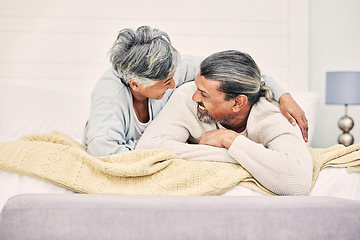 Image showing Funny, playful or old couple in bedroom to relax, enjoy romance or morning time together at home. Hugging, silly senior woman or happy elderly man laughing or bonding with love or smile in retirement