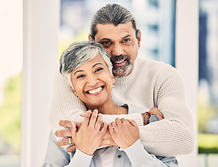 Image showing Portrait, happy and senior couple hug in house to relax in retirement together. Face, embrace and elderly man and woman smile for love, care and trust for support, commitment or loyalty in marriage.