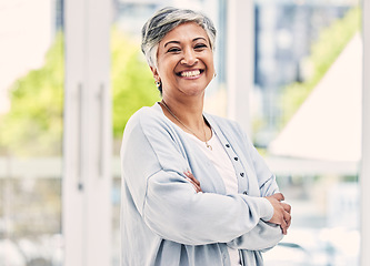 Image showing Portrait, happy and senior woman with arms crossed in house for positive mindset, relax in retirement home and joy. Face, smile and elderly female person from India with confidence in casual clothes.