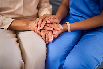 Image showing Hands, medical or support with a nurse and patient in a living room for love, trust or care during treatment. Healthcare, empathy and a black woman medicine professional comforting a clinic resident