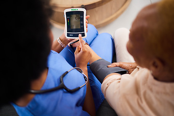 Image showing Doctor, machine or patient in test for blood pressure in a hospital for medical or healthcare exam. Monitor, screen or closeup of hands caregiver or woman with digital equipment for chronic disease