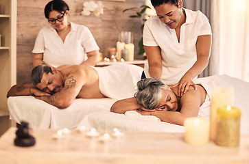 Image showing Massage, senior and a couple at the spa to relax on their anniversary together for peace, wellness or bonding. Luxury, beauty or body care with an old woman and man in a salon for physical therapy