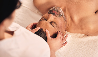 Image showing Man, spa and head massage for skincare treatment, holistic therapy and zen healing at beauty salon from above. Mature male person relax at wellness retreat for self care, peace and facial acupressure