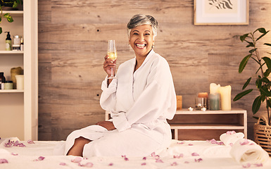 Image showing Spa, champagne and happy woman in portrait for facial, massage and holiday celebration or self care. Excited, wine glass and senior person luxury, wellness and relax with hospitality service or hotel