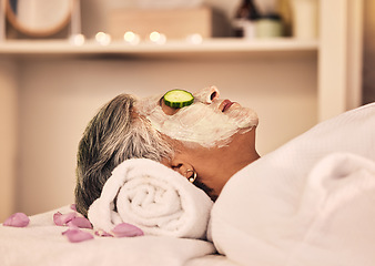 Image showing Woman, spa and relax with face mask, cucumber and skincare treatment at beauty salon. Calm mature female client cooling eyes at wellness resort with facial cleaning, hydration glow or cream cosmetics