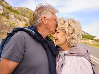 Image showing Senior couple, fitness and run with kiss, forehead and nature for love, wellness or outdoor exercise. Elderly man, woman and romantic with bonding, happy training and workout for health in retirement