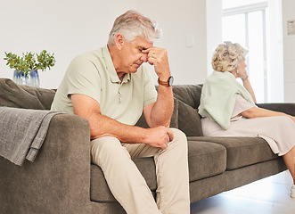 Image showing Angry, senior man and fight on sofa in divorce, breakup and stress of sad separation at home. Argue, depression and frustrated couple on couch in conflict, crisis and problem of drama in bad marriage