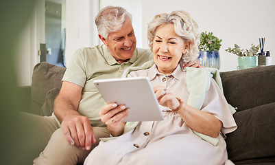 Image showing Senior couple, tablet and smile on sofa in home living room for news app, movies or streaming internet show. Happy woman, elderly man and digital technology for social media, reading ebook or website