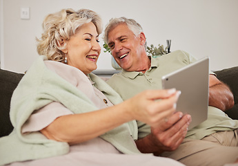 Image showing Senior couple, relax and tablet on sofa in home living room for love, movies and streaming internet show. Happy woman, elderly man and digital technology for social media, reading news app or website
