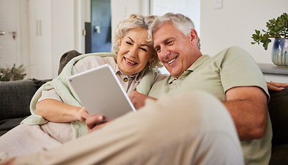 Image showing Senior man, woman or tablet on sofa to download news app, reading social media post or ebook. Happy elderly couple scroll website on digital technology, internet blog or online shopping in retirement