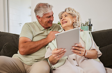 Image showing Happy senior couple, tablet and sofa to download news app, reading social media post and ebook. Elderly man, woman and digital technology to scroll website, internet and online shopping in retirement