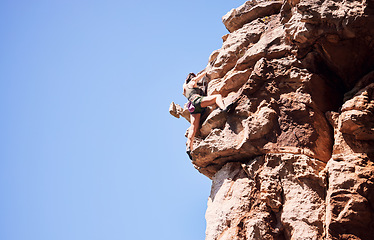 Image showing Fitness, rock climbing and space with woman on mountain for sports, adventure and challenge. Fearless, workout and hiking with person on training cliff for travel, freedom and exercise mockup