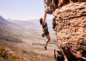 Image showing Sports, rock climbing and training with woman on mountain for fitness, adventure and challenge. Rope, workout and health with person on cliff in nature for travel, freedom and exercise mockup