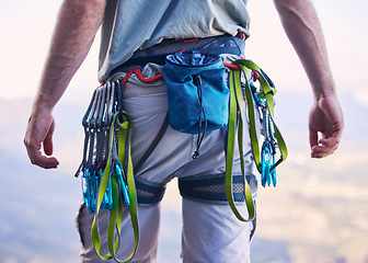 Image showing Nature, rock climbing and man with gear and harness for adventure, freedom and sports on mountain. Fitness, hiking and male person with equipment and chalk bag for training, activity and challenge