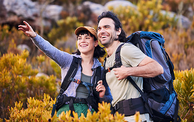 Image showing Hiking, travel and couple pointing on mountain for adventure, holiday and sightseeing journey in nature. Happy, dating and excited man and woman walking to explore, trekking and backpacking outdoors
