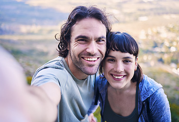 Image showing Hiking, selfie and portrait of couple in nature for adventure, holiday and journey on mountain. Travel, dating and happy man and woman take picture for social media, trekking and healthy memories