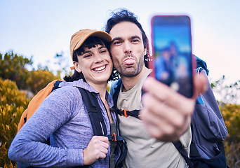 Image showing Hiking, silly selfie and couple on mountain for adventure, holiday and journey on mountain. Travel, dating and happy man and woman take goofy picture for memories, trekking and backpacking outdoors