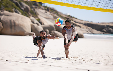 Image showing Beach, volleyball and team at net with sports action, fun and summer competition on sea sand. Energy, ocean games and volley challenge with men hitting ball for winning goal at workout in nature.