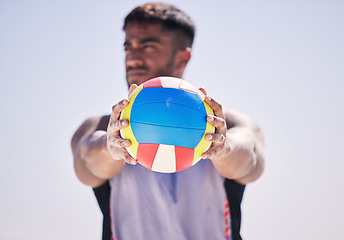 Image showing Beach, fitness or man with volleyball to serve for game, workout training or sports training in summer. Thinking, athlete or hands of player holding ball ready to start contest or exercise at ocean