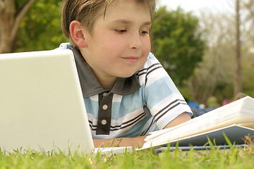 Image showing Studying or reading in the park