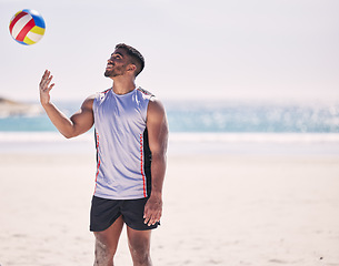 Image showing Relax volleyball or happy man at beach with ball playing game, workout training or fitness in summer. Air, sports athlete smiling or player ready to start practice match or exercise at ocean alone