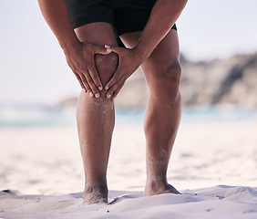 Image showing Hands, knee pain and man at a beach for fitness, exercise and performance training with problem. Leg, injury and male player with arthritis, fibromyalgia or osteoporosis crisis during workout