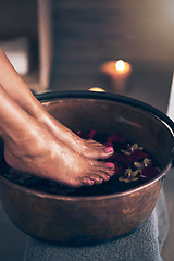 Image showing Spa, health and woman feet in water to soak with flowers for a luxury, glamour and pedicure treatment. Wellness, beauty and closeup of female person relaxing for a zen self care routine at calm salon